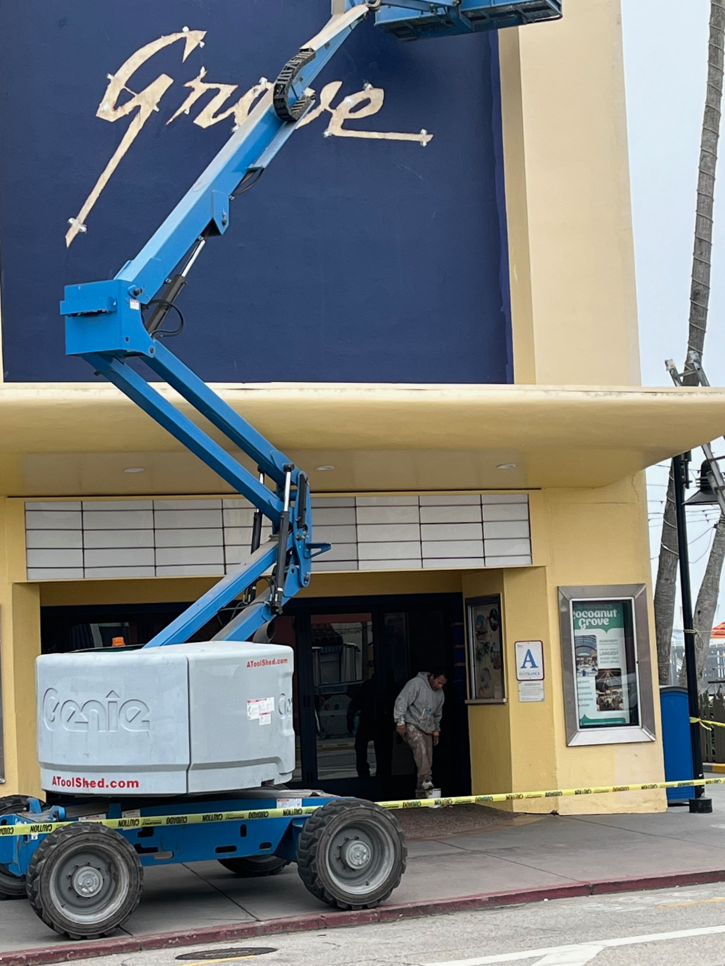 Boom lift work on the Cocoanut Grove entrance facade